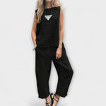 Black sleeveless tunic top and matching wide-leg pants, linen-cotton blend