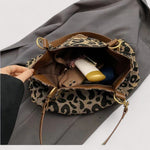 Leopard print tote bag open-top with brown lining and visible inner pockets