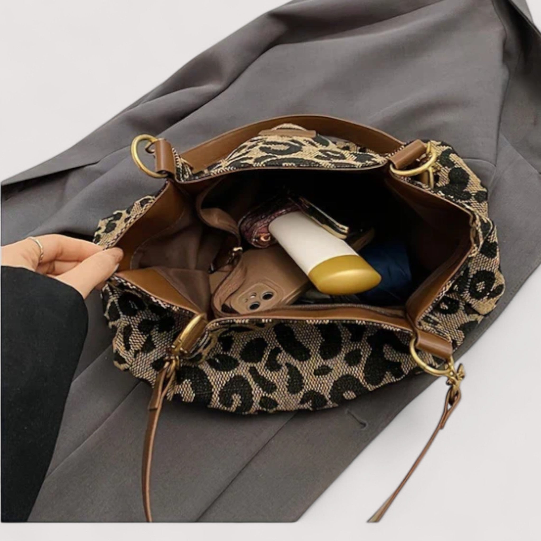 Leopard print tote bag open-top with brown lining and visible inner pockets