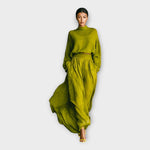 Green knit turtleneck sweater and flowing maxi skirt set