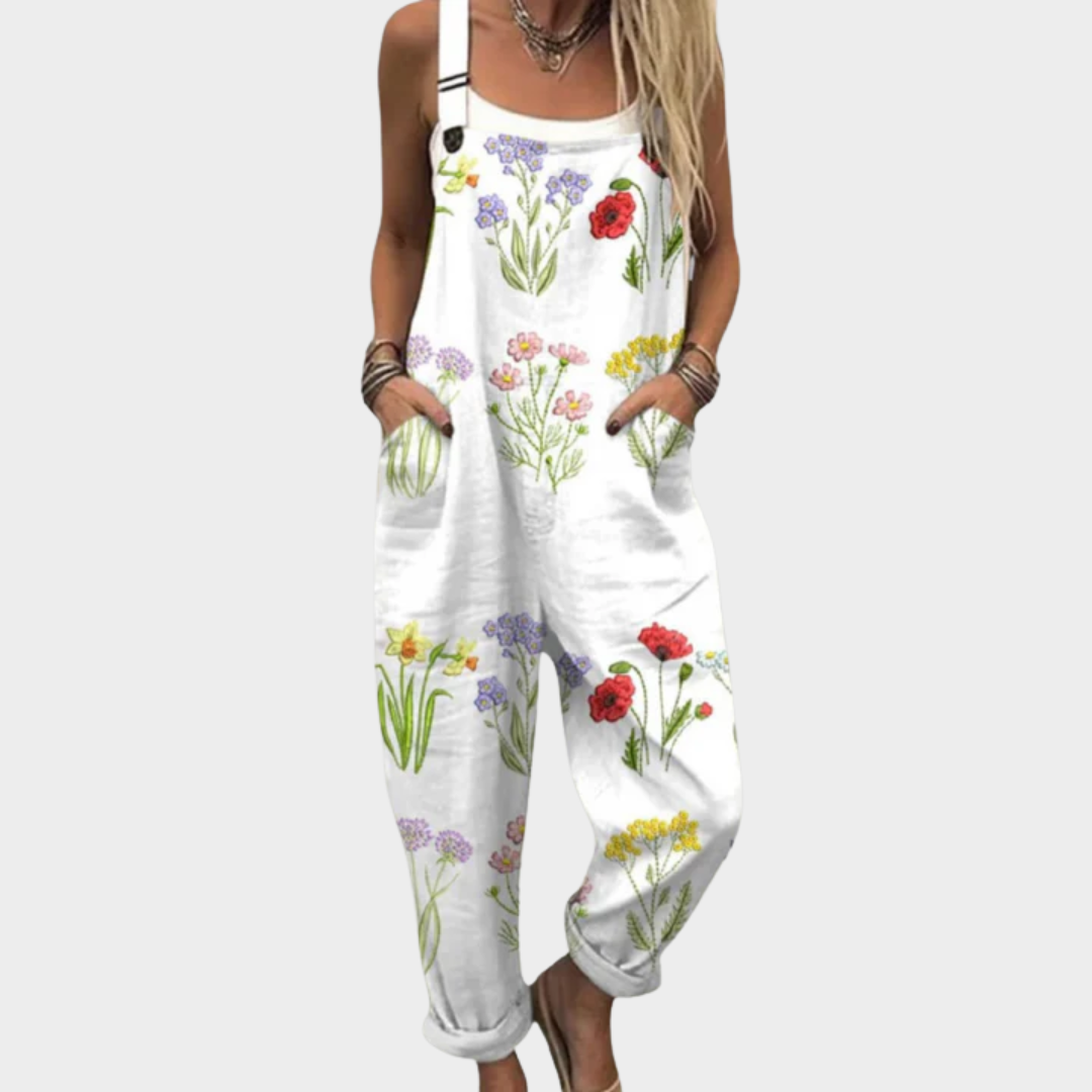 Loose floral print overalls, white with colorful flower pattern, adjustable shoulder straps
