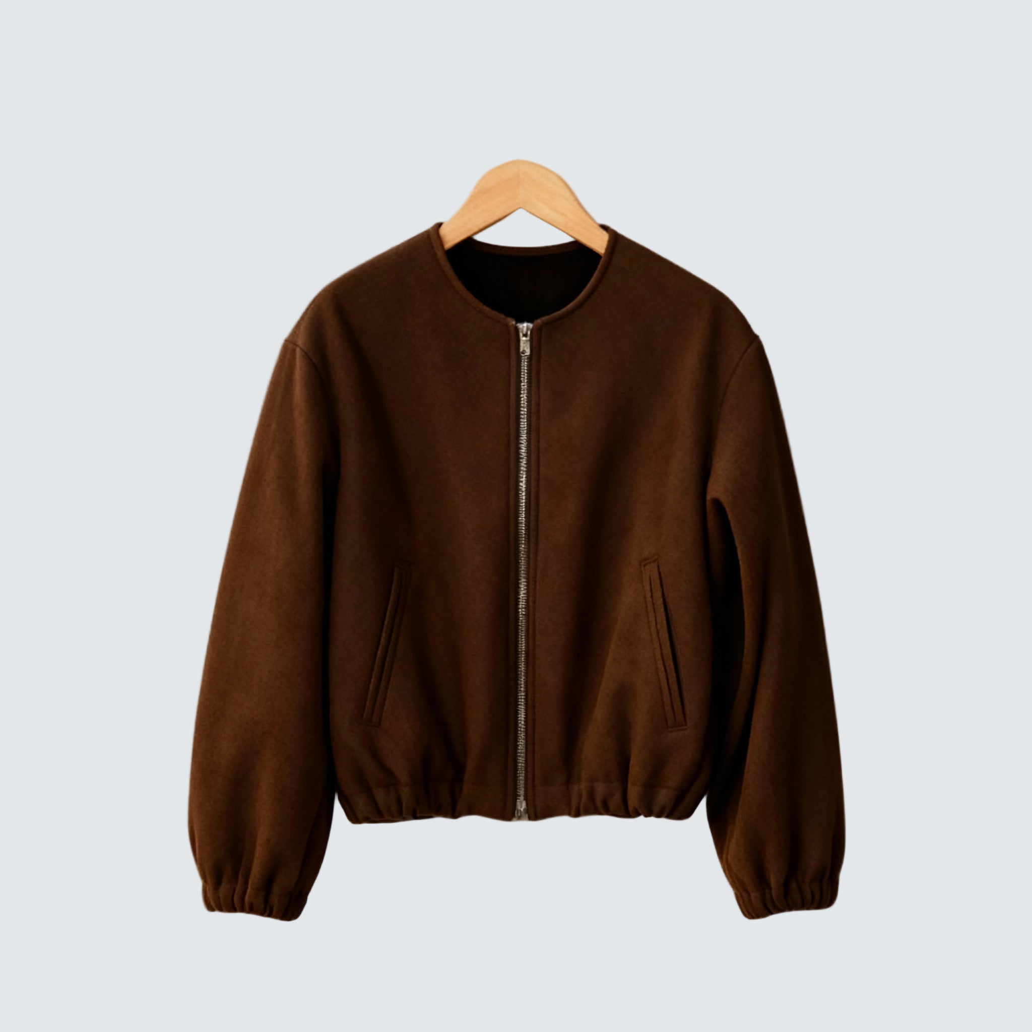 Dark brown cropped zip-front bomber jacket with elastic cuffs and hem pockets