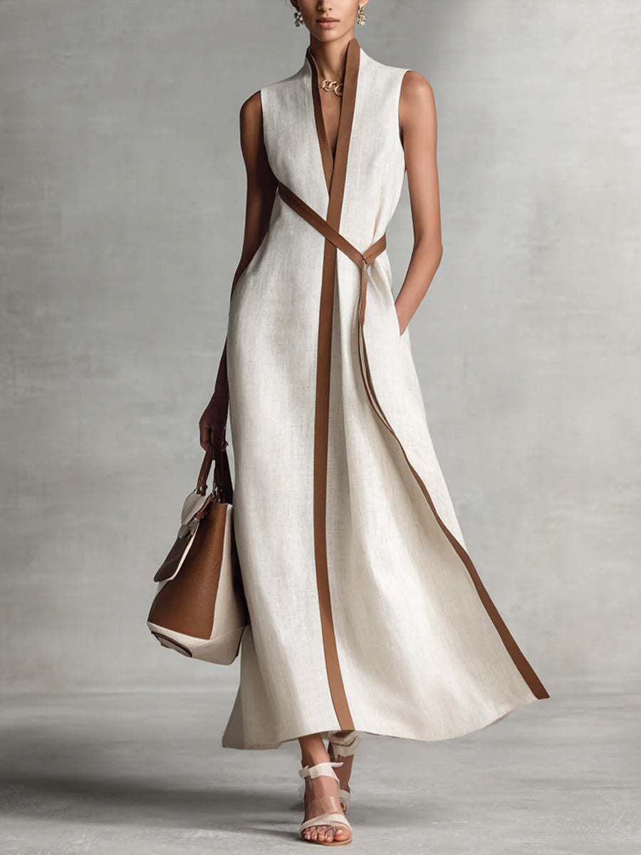 Elira linen dress in off-white with deep V-neck and diagonal tie panel, sleeveless maxi