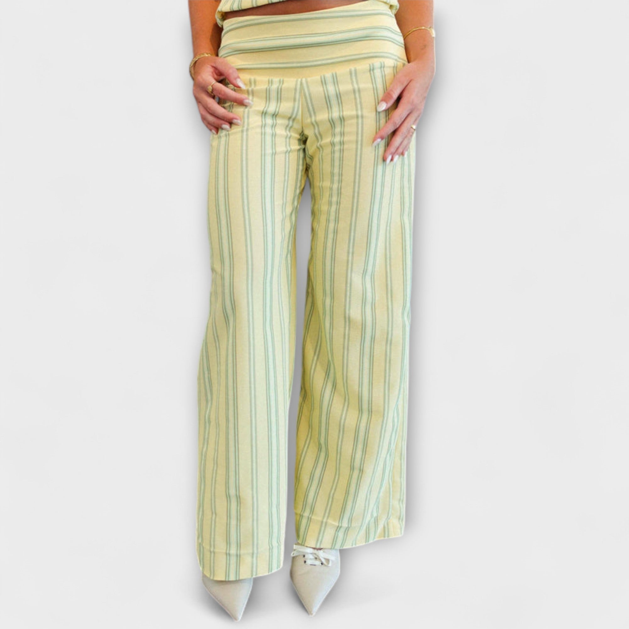 High-waist striped wide-leg pants with front pleats and vertical light yellow and pale blue stripes