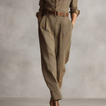 Women’s brown plaid overalls with belt, buttoned shirt collar, and tapered legs