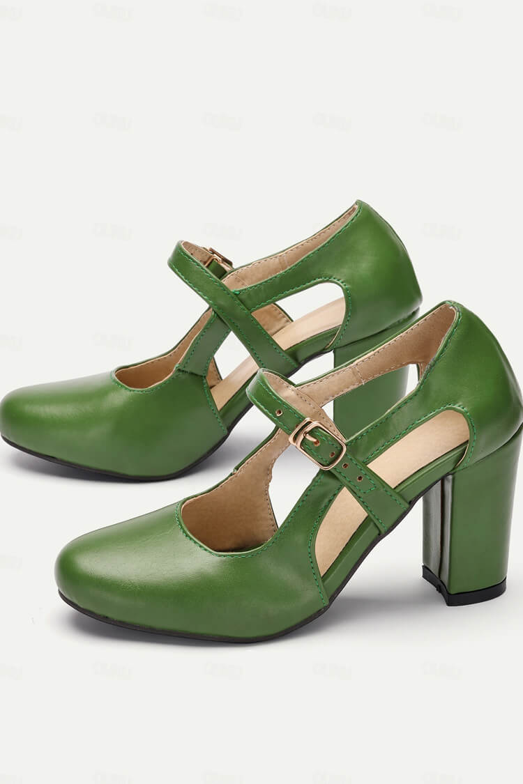 Light green leather-look heeled comfort Mary Jane shoes with cross straps and buckle.