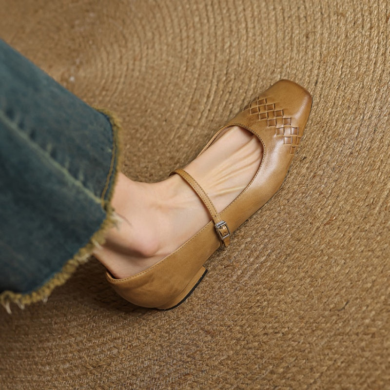Tan Mary Jane flat with square toe, ankle strap, and woven lattice upper