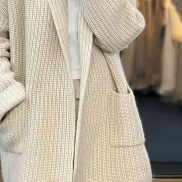 Cream knitted cardigan front with patch pocket and open placket