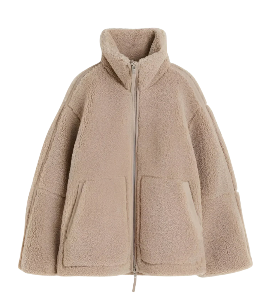Beige sherpa zip-up winter jacket with stand collar and two front flap pockets