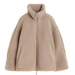 Beige sherpa zip-up winter jacket with stand collar and two front flap pockets