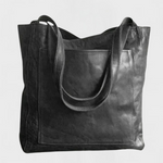 Black leather tote bag with double top handles and front stitched panel.