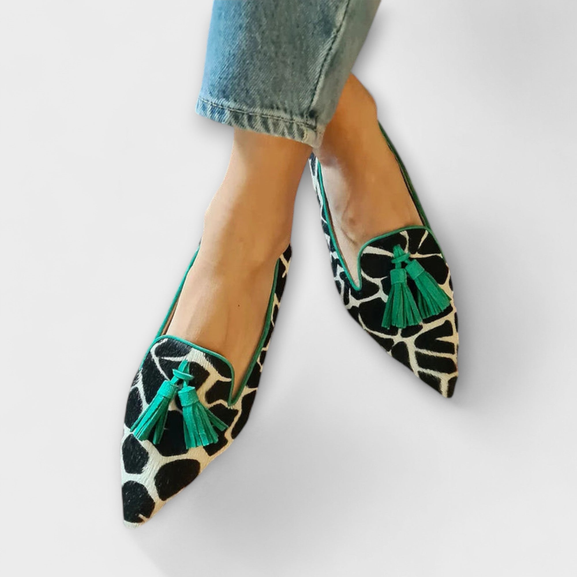 Julia cow-print loafers with green tassels and green trim