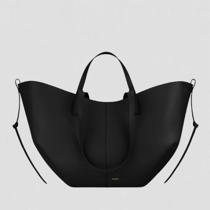 Large black tote bag with top handles and side loop straps, curved open shape