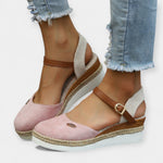 Orthopedic espadrilles with ankle strap and buckle, pink suede and jute-woven sole.