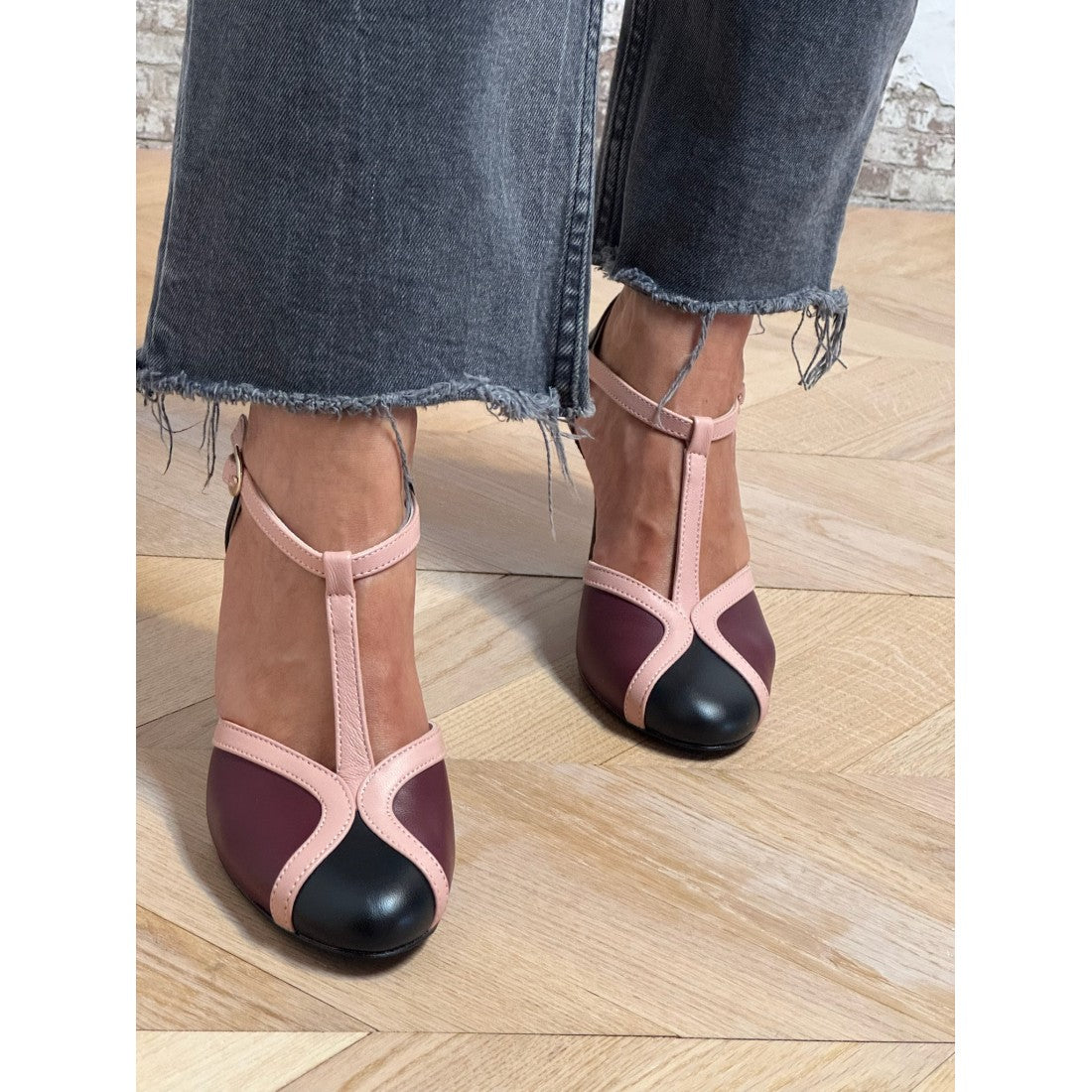Heeled T-bar mary jane shoes with blush straps and burgundy/black color-blocking