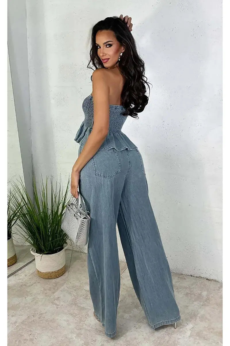 Light blue denim two-piece set: strapless smocked ruffle top and wide-leg drawstring jeans