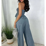 Light blue denim two-piece set: strapless smocked ruffle top and wide-leg drawstring jeans