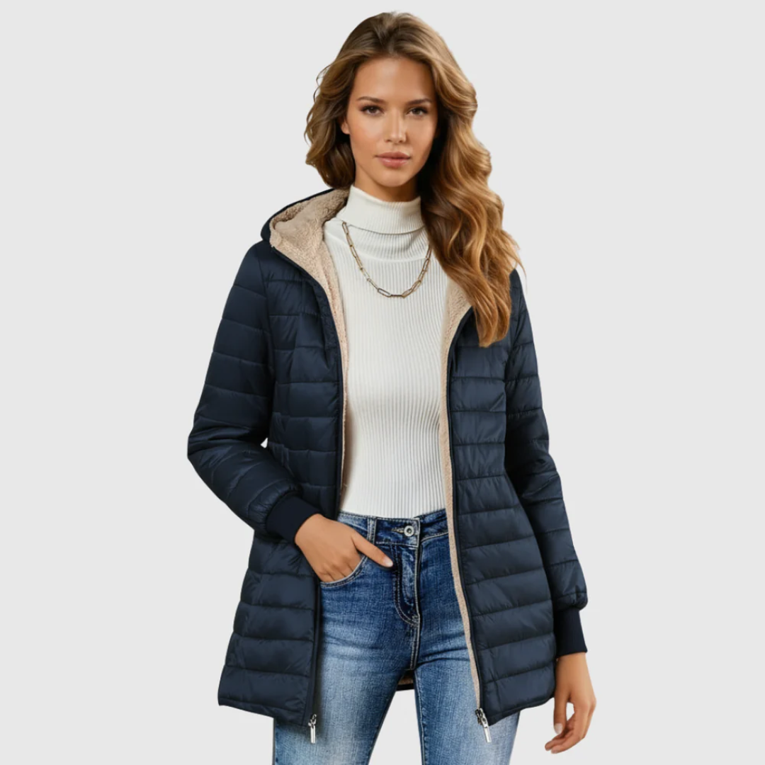 Puffy winter coat in dark navy, quilted with sherpa-lined hood and zip pockets