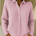 Pink knit cardigan with collared button front and ribbed cuffs and hem.