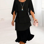 Black tiered ruffle midi dress with elbow-length cape sleeves and layered tiers