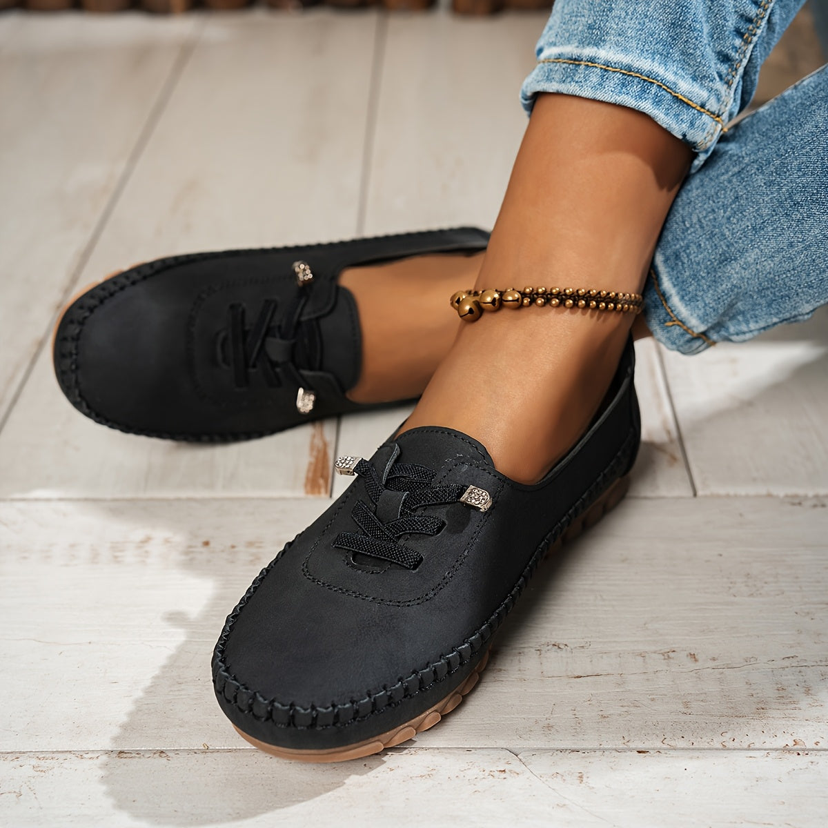 Black suede-look lace-up slip-on loafer shoes with textured rubber tread sole