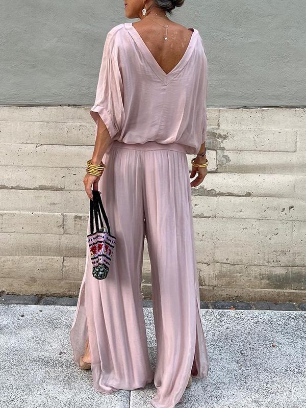 Two-piece chiffon set with backless V-neck blouse and wide-leg pants, dusty pink.