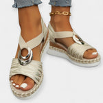 Roman knit sandals, cream knit straps with large silver buckle and espadrille wedge sole