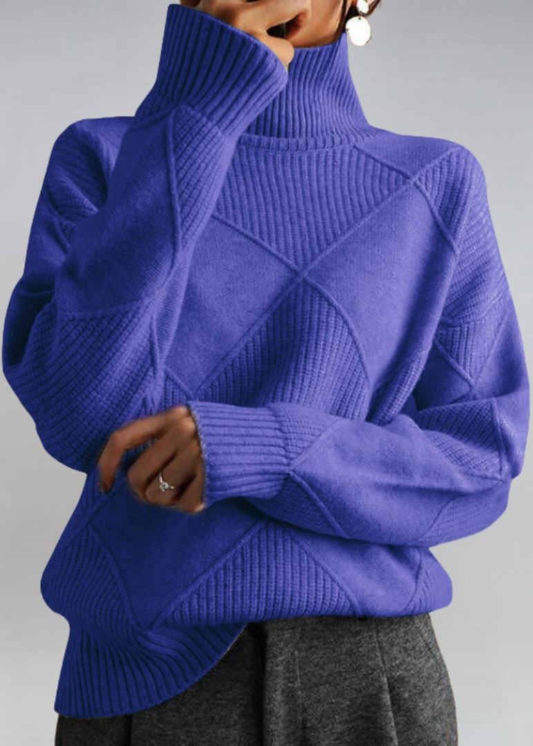 Royal blue high-neck sweater with ribbed turtleneck and diagonal knit panel detail.