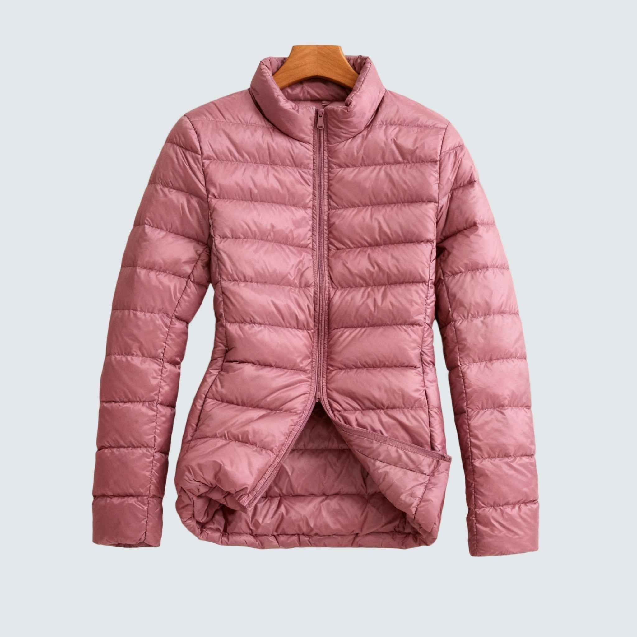Pink puffer jacket with full front zipper and high stand collar, long sleeves.