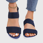 Navy orthopedic sandals with wide straps and open toe, textured upper, cushioned sole