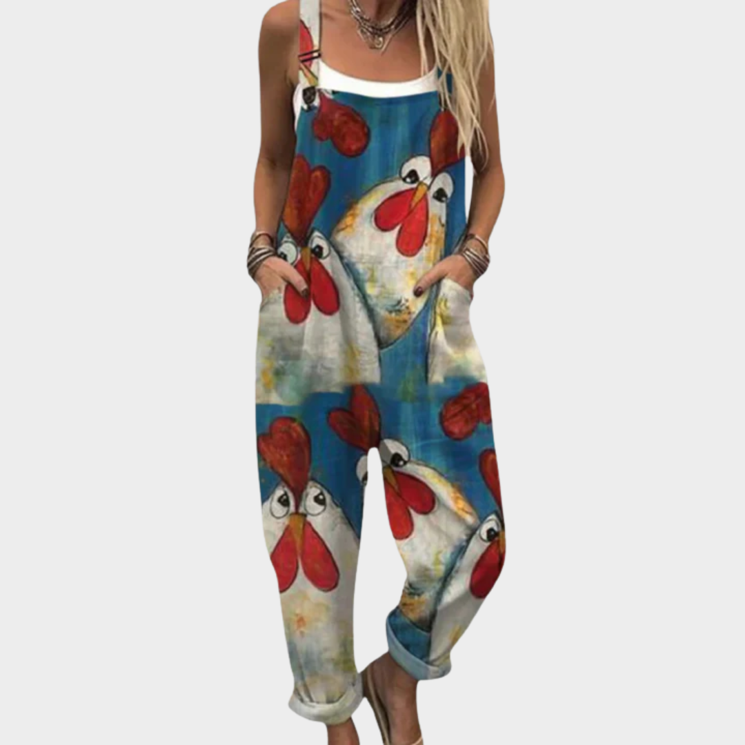 Loose printed overalls, sleeveless with red/blue dog face pattern and adjustable straps