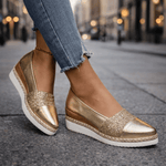 Gold glitter espadrille wedge sandal with V-cut upper and rope-wrapped sole