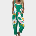 Green loose overalls with colorful bird print, adjustable straps and front bib pocket