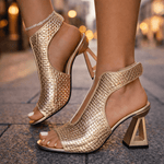 Gold woven peep-toe heeled sandals with ankle strap and chunky block heel
