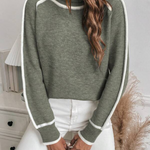 Olive green knit sweater with white trim stripes along collar, cuffs, and hem