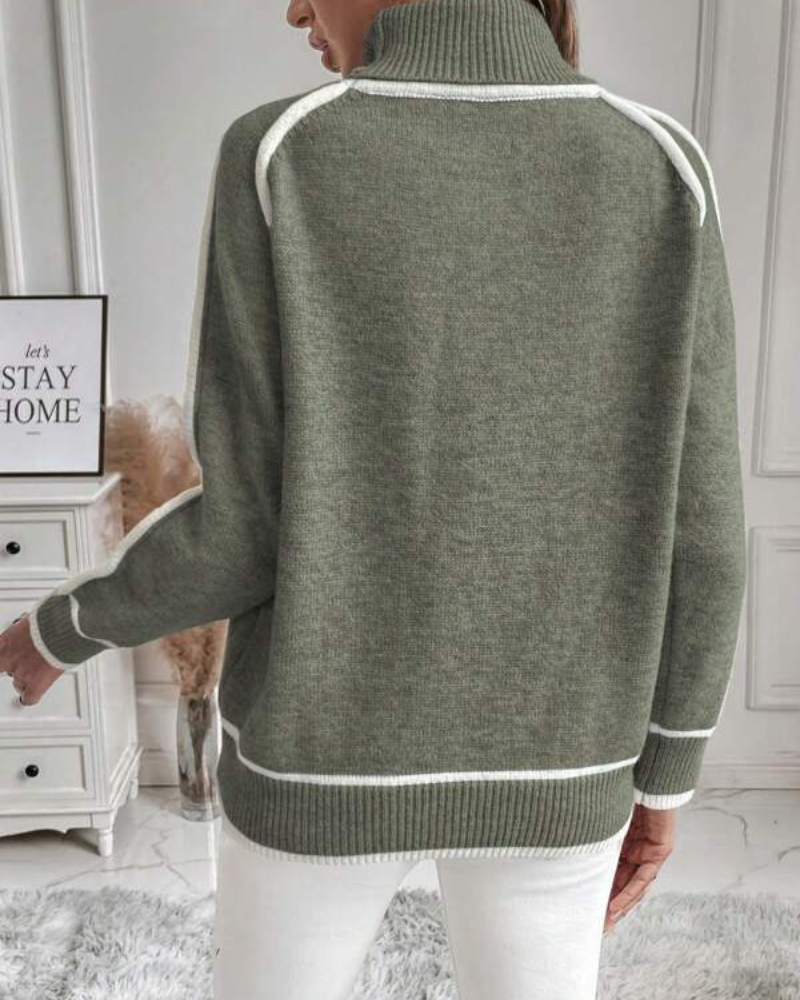 Olive green knit sweater, back view; white contrast stripe edging on shoulders and hem