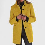 Mustard yellow classic button-front coat with flap pockets and long sleeves