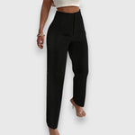 Black high-waisted trousers, tapered ankle length, front seam detail