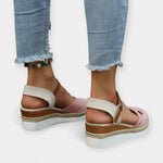 Orthopedic espadrilles with ankle strap and buckle, light pink suede, jute wedge sole.