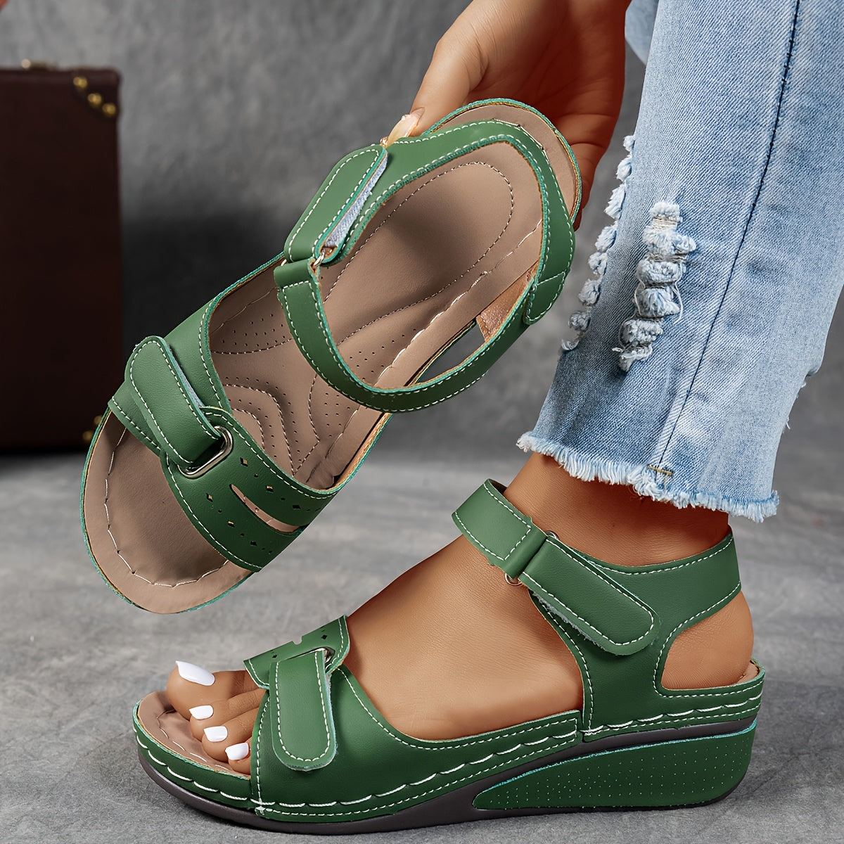 Green orthopedic comfort sandals with hook-and-loop straps and cushioned wedge sole