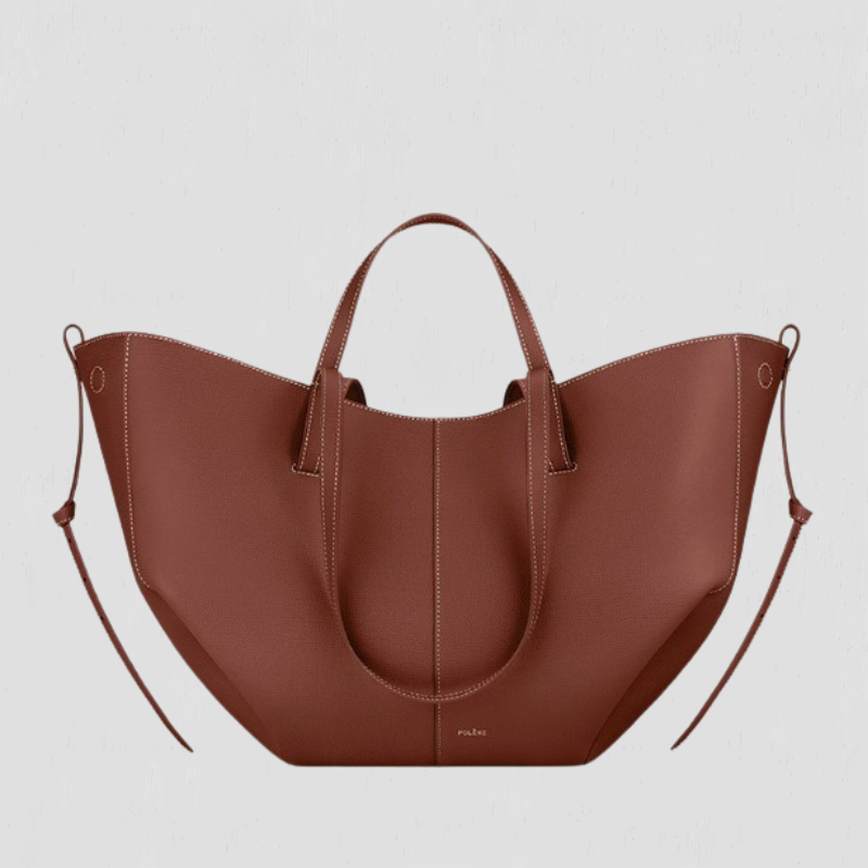 Large rust-brown tote bag with top handles and side loop straps, curved open shape