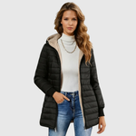 Puffy winter coat in black, quilted puffer with sherpa-lined hood and zip details