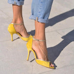 Yellow high-heel peep-toe sandals with ankle strap and slim pointed stiletto heel