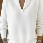 White V-neck knit sweater with long sleeves and ribbed cuffs and hem