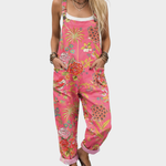 Pink loose printed overalls with thin straps and wide legs