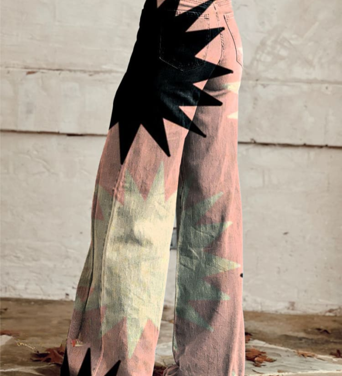High-waist wide-leg boho pants, pink-green abstract print with large black starburst shapes