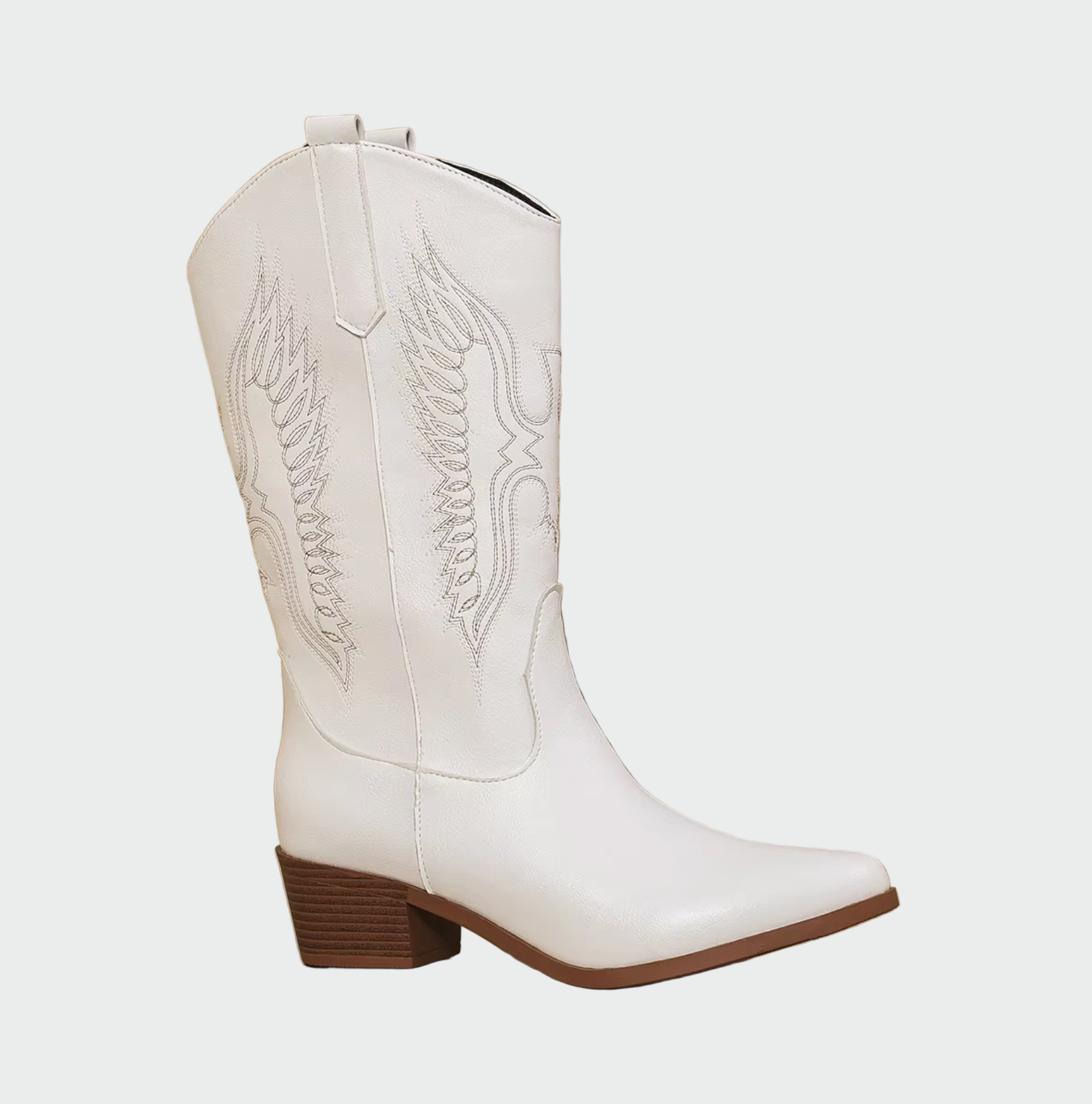 White cowboy boots in leather with pointed toe and stitched wing embroidery
