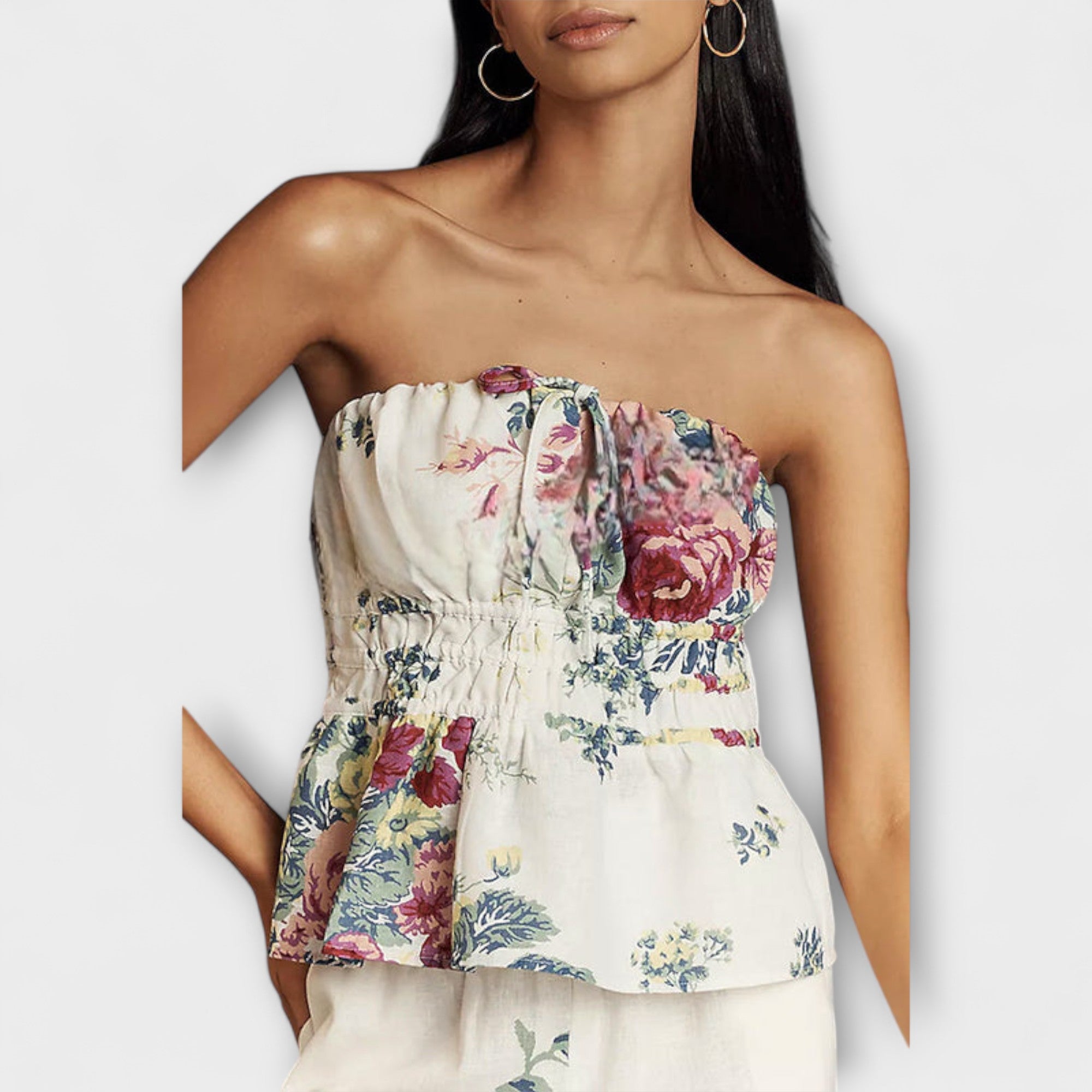 Floral strapless peplum top with gathered bust and ruffled waist, cream with multicolor print