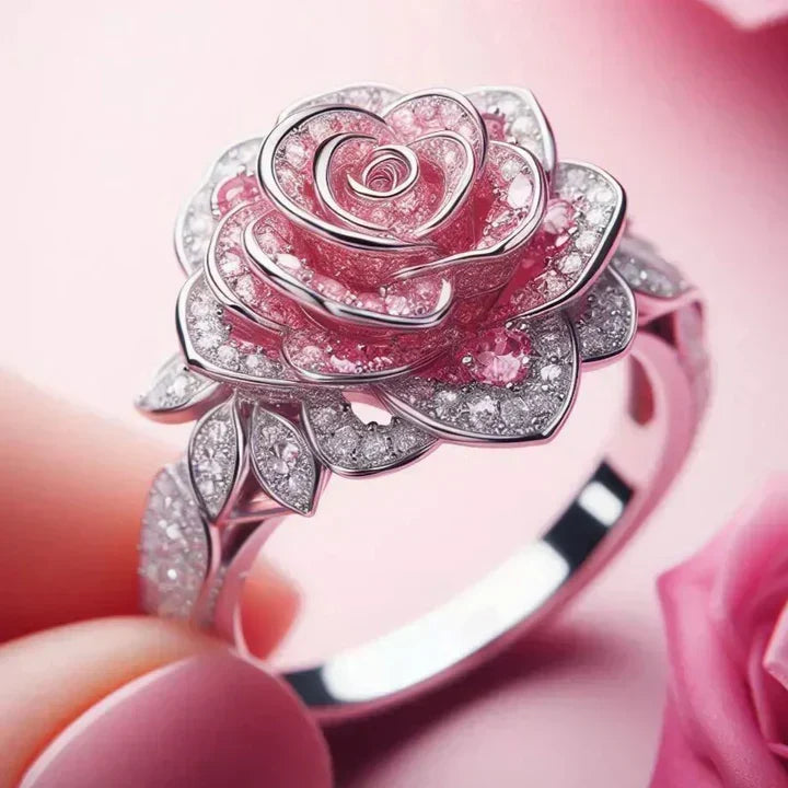 Exotic floral silver ring with pink rose motif and sparkling clear gemstones