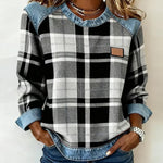 Women’s flannel pullover with black-and-white plaid, denim collar and cuffs, chest patch
